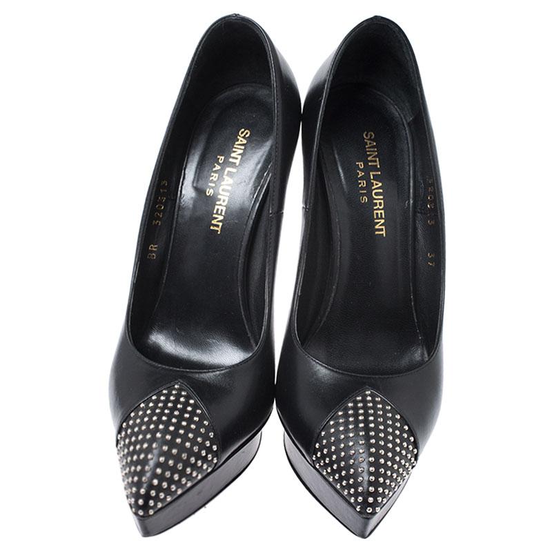 These stunning pumps from the house of Saint Laurent Paris exude style and glamour. Crafted in Italy, they are made of leather and come in a classic shade of black. They feature pointed cap toes with small silver-tone stud detailing, 13 cm heels,