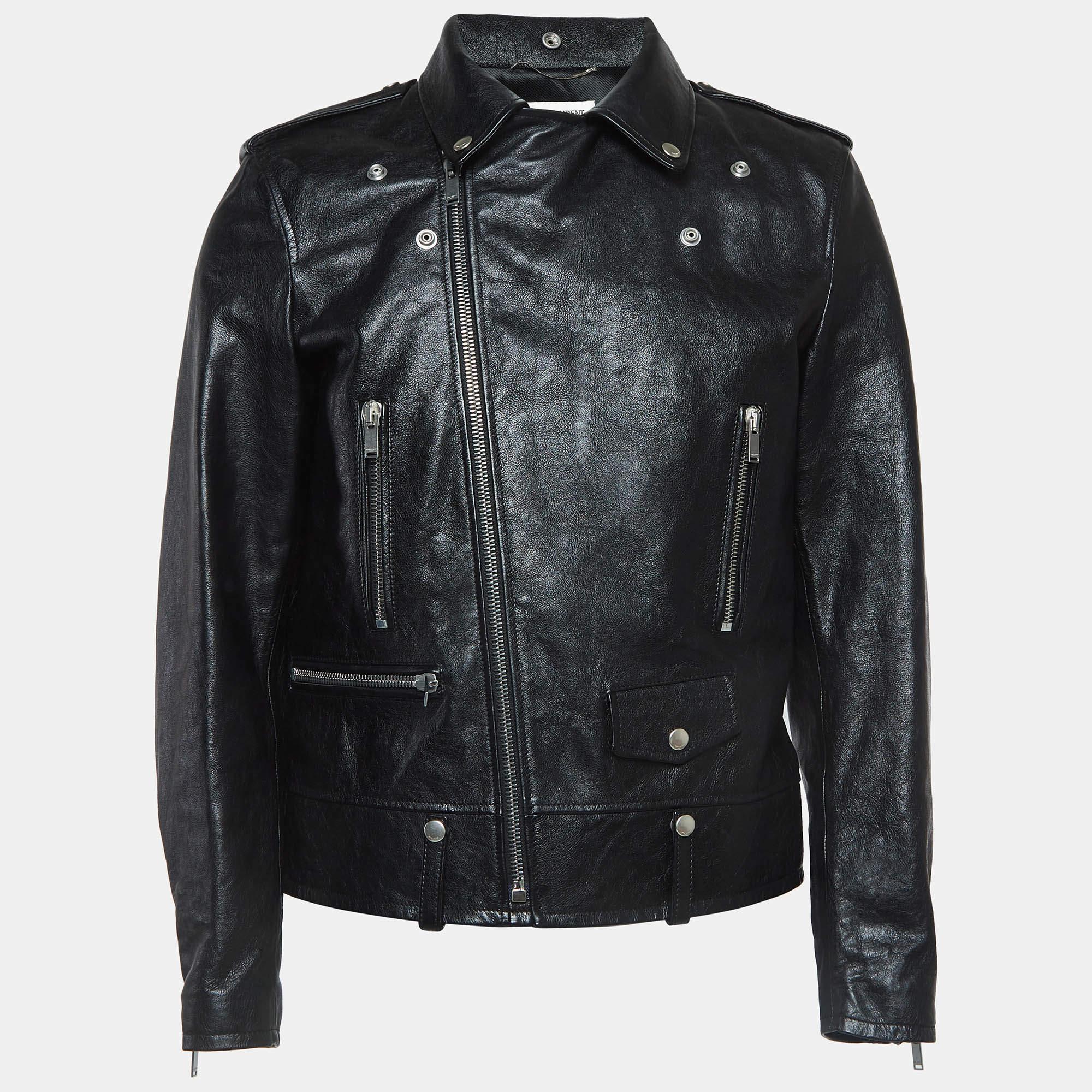 The biker jacket is the epitome of edgy sophistication. Crafted from high quality leather this piece features a sleek tailored silhouette with zip detailing. Its rebellious charm and timeless appeal make it a must have addition to any fashion