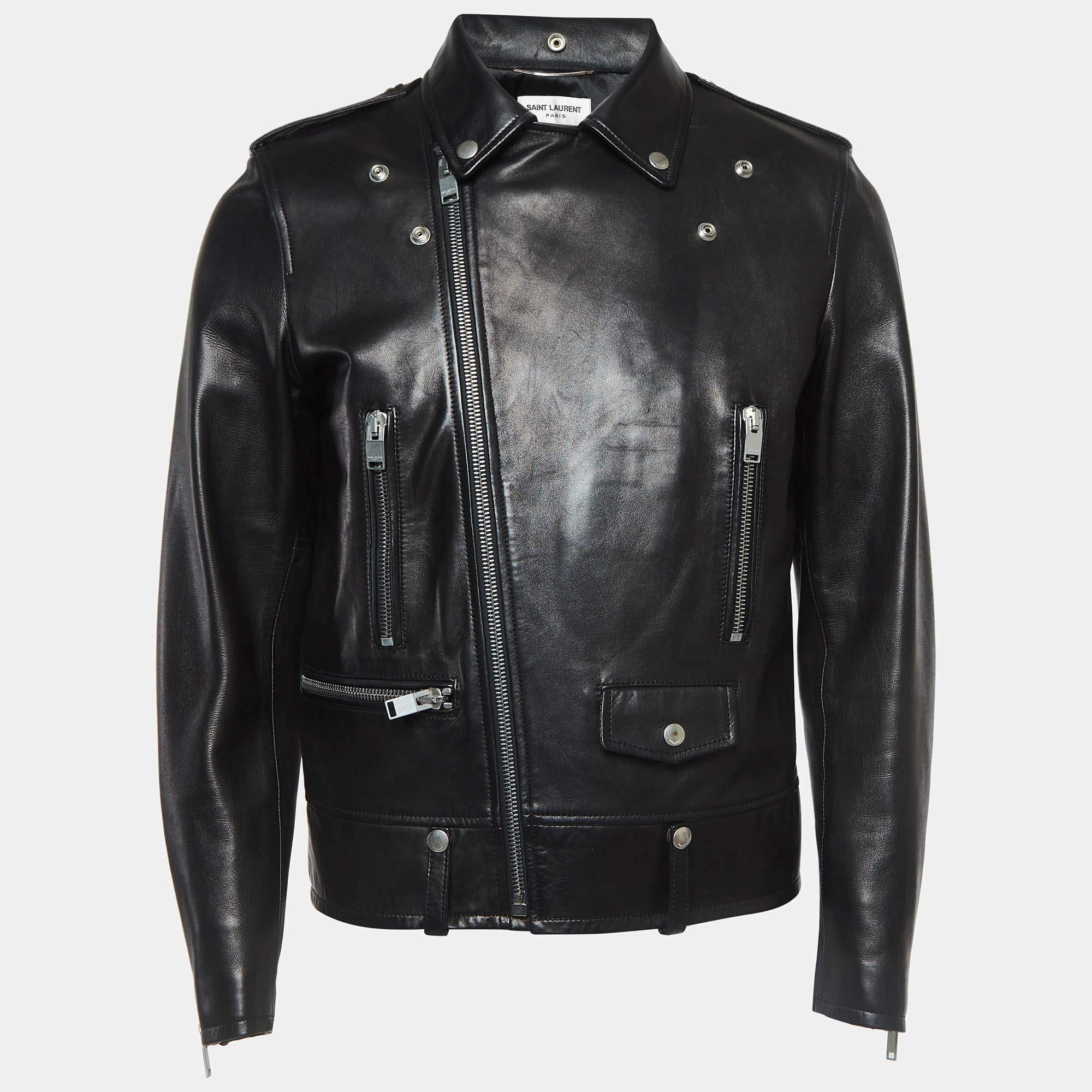 The biker jacket is the epitome of edgy sophistication. Crafted from high quality leather this piece features a sleek tailored silhouette with zip detailing. Its rebellious charm and timeless appeal make it a must have addition to any fashion