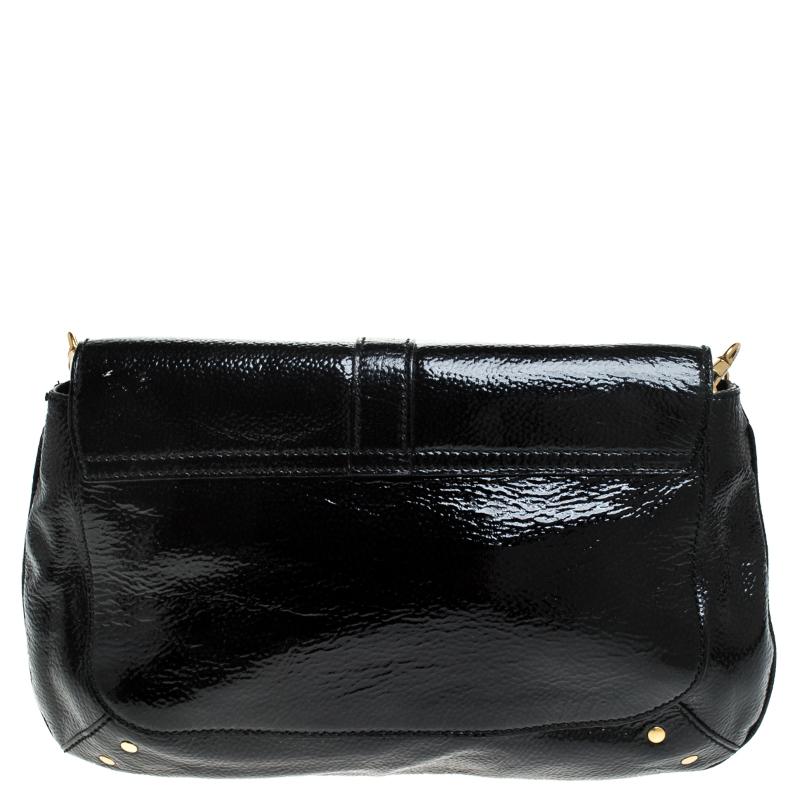 Now here's a bag that is both stylish and functional! Saint Laurent Paris brings us this gorgeous Emma shoulder bag that has been crafted from patent leather in a black hue. It has a flap leading way to a lovely fabric interior capable of carrying