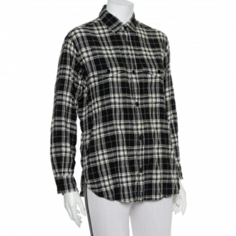 This smart shirt from Saint Laurent Paris definitely needs to be on your wishlist! The shirt is made of cotton and features a plaid pattern all over it. It flaunts front button fastenings, two pockets and long cuffed sleeves. Pair it with pants and