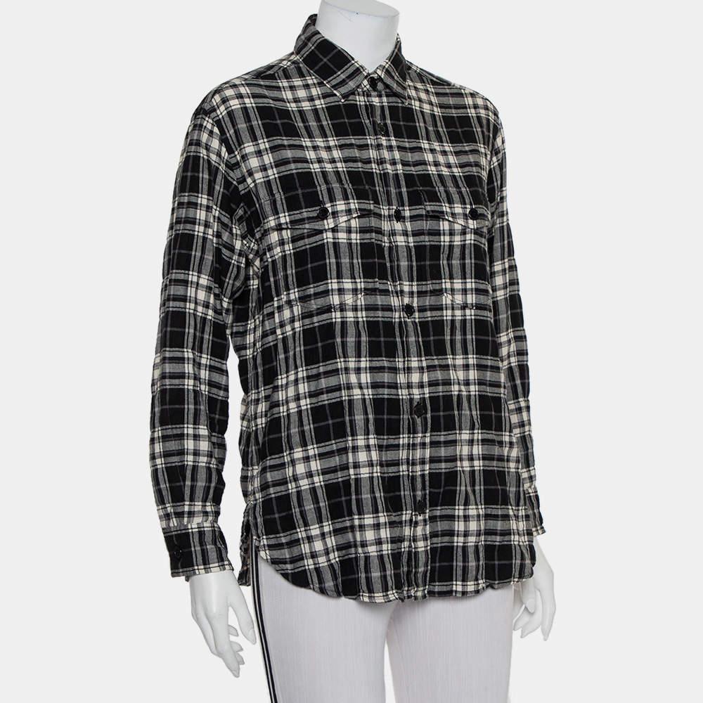 This smart shirt from Saint Laurent Paris definitely needs to be on your wishlist! The shirt is made of cotton and features a plaid pattern all over it. It flaunts front button fastenings, two pockets and long cuffed sleeves. Pair it with pants and