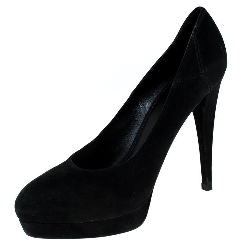 This pair by Saint Laurent Paris has a very charming appeal. The classy pair is crafted from suede and features a comfortable leather sole with 13.5cm high stiletto heels. Style your outfit by pairing it with these elegant black pumps.

Includes:
