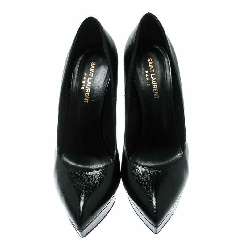 You'll love to flaunt these Janis pumps from Saint Laurent Paris that will gladden your heart every time you receive a compliment. The black pumps are crafted from textured leather and feature an elegant silhouette. They flaunt pointed toes, 14 cm