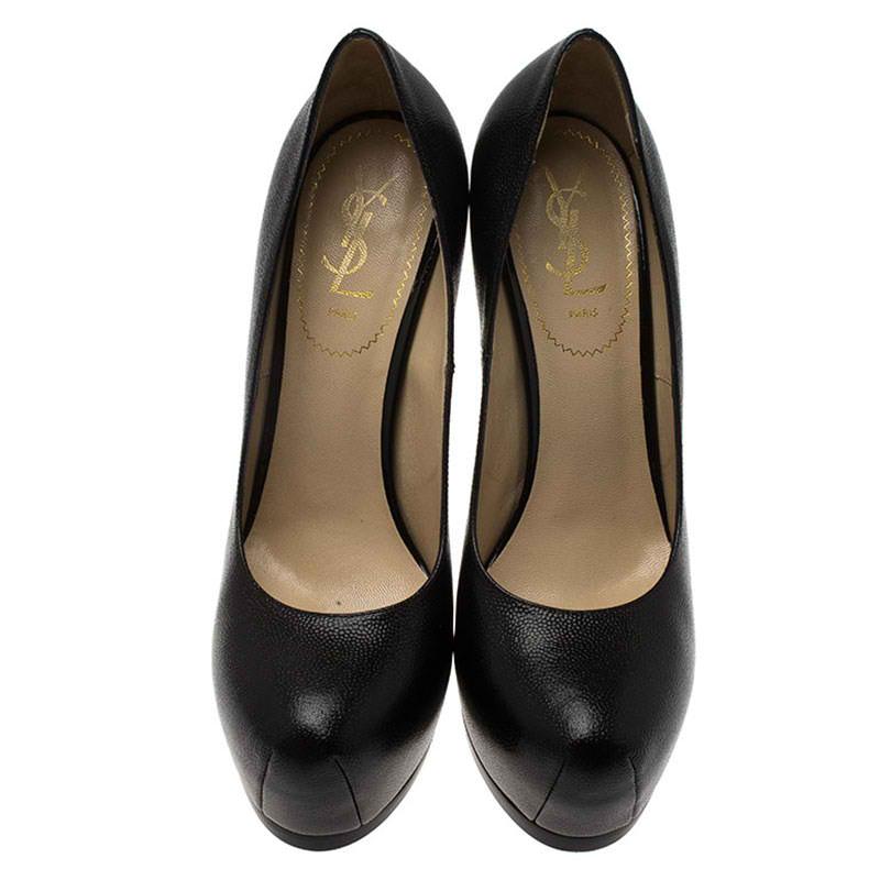 Fashionable and chic, these pumps from Saint Laurent Paris will cut an alluring silhouette from day to night. Crafted from textured leather, the pumps have a black shade, concealed platforms, and 15 cm heels.

Includes: The Luxury Closet Packaging


