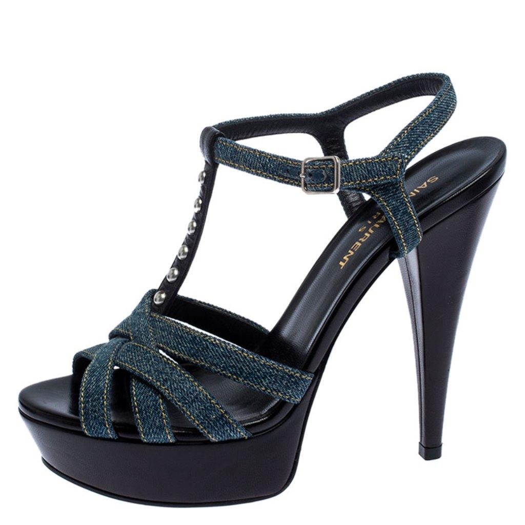 One of the most sought-after designs from Saint Laurent is their Tribute sandals. They are such a craze amongst fashionistas around the world, and it is time you own one yourself. These blue ones are designed with quality denim and feature straps,