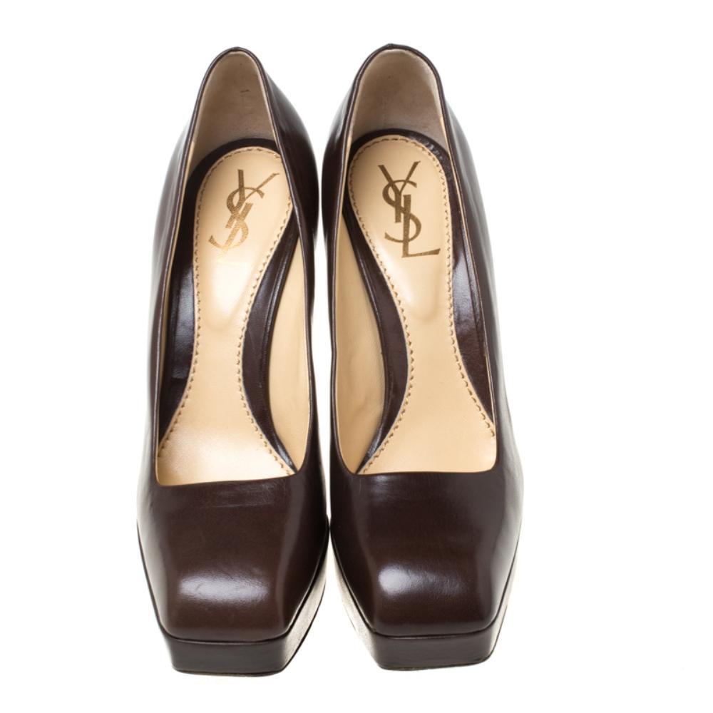 Crafted out of leather, these pumps are a charming add-on accessory that you absolutely need to own. Made by Saint Laurent Paris, this pair is the perfect mix of comfort and style. Wear these fabulously designed pumps in a classic brown shade to