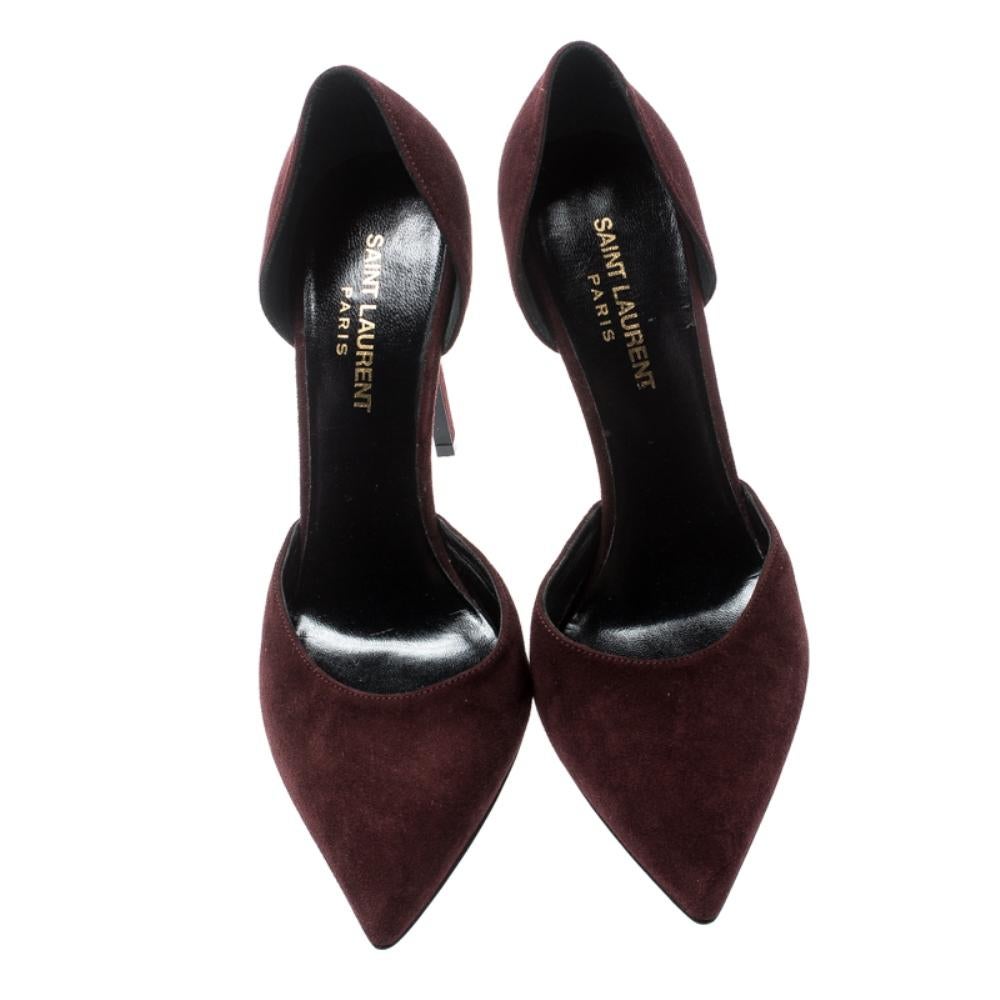 Create a sophisticated look with this pair of suede pumps from Saint Laurent Paris. The pumps feature a d'orsay cut, pointed toes, and 10.5 cm heels. Add a burgundy touch to your style by donning this pair of pumps.

Includes: The Luxury Closet