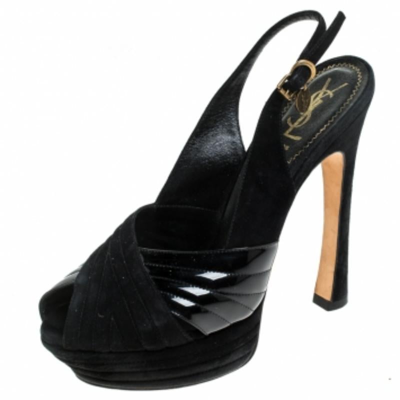 Affichez ces fabuleuses sandales Saint Laurent Paris et sortez avec style. Ces sandales en daim et cuir verni sont l'incarnation de la mode et du confort. Ils sont dotés de peep toes, d'escarpins et de talons de 14.5 cm soutenus par des