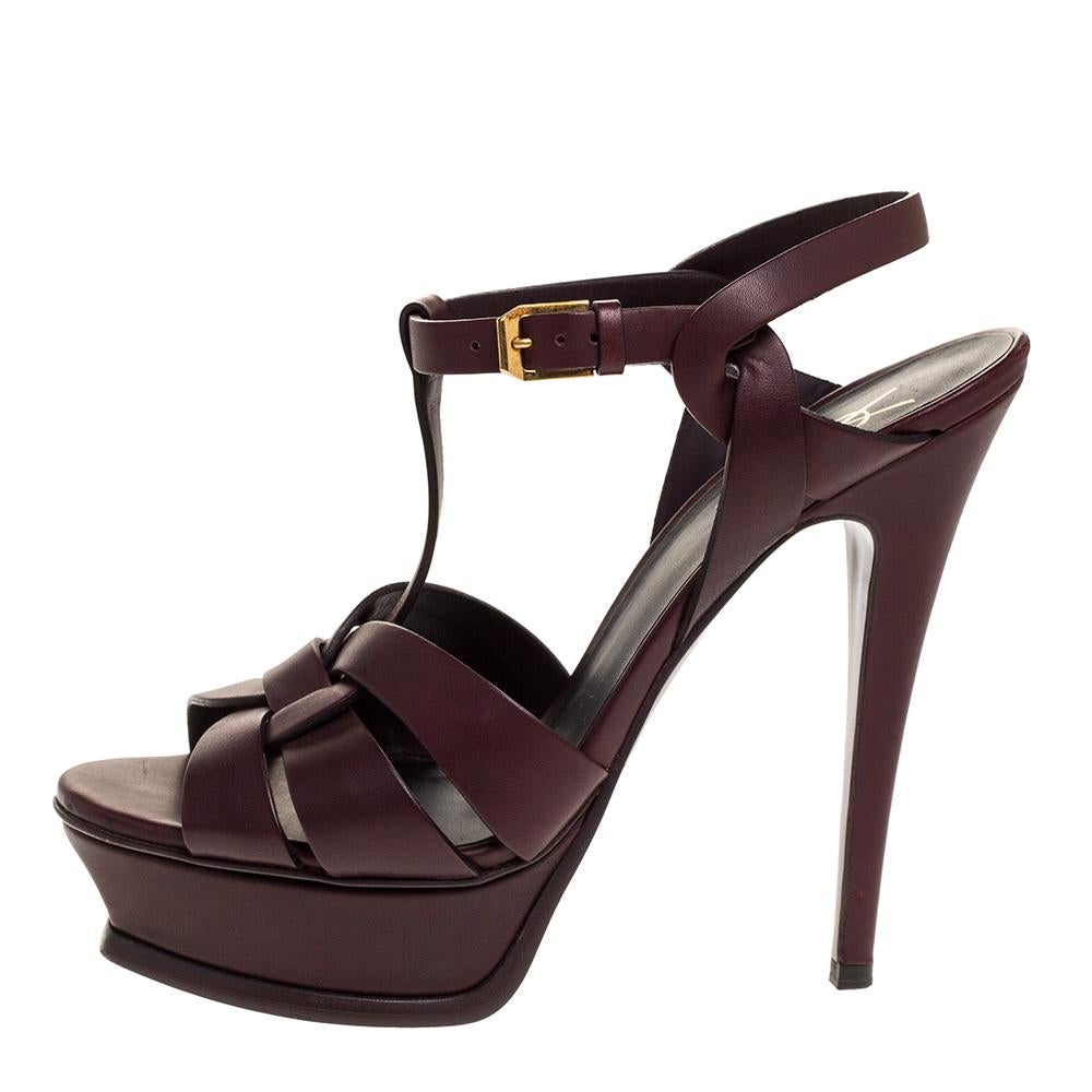 One of the most sought-after designs from Saint Laurent is their Tribute sandals. They are such a craze amongst fashionistas around the world, and it is time you own one yourself. These burgundy ones are designed with leather straps, ankle