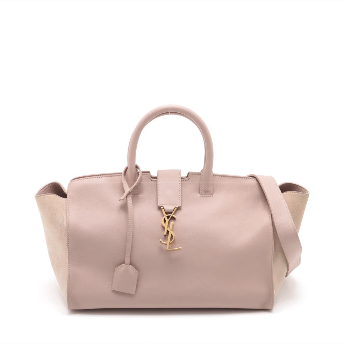 *will ship about 3/10

The Saint Laurent Paris Downtown Cabas Suede and Leather Two-Way Handbag in Pink is a chic and sophisticated accessory that blends modern elegance with practicality. Crafted from a luxurious combination of soft suede and