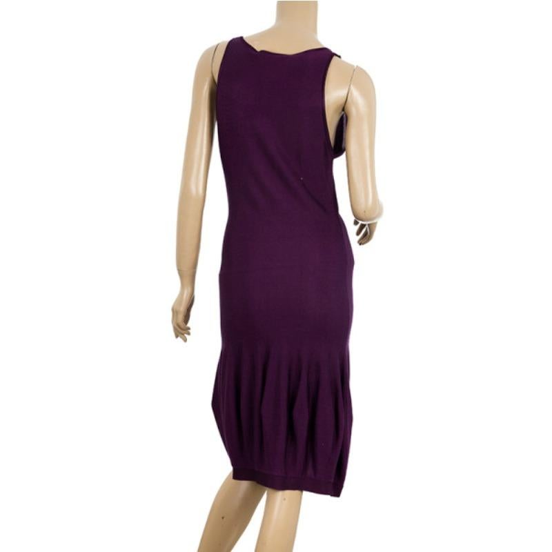 This beautiful dress from YSL is made from a blend of cotton and viscose. This sleeveless purple dress features a ribbed hem and a plunging v-neck. 

Includes: The Luxury Closet Packaging

Size: Small

