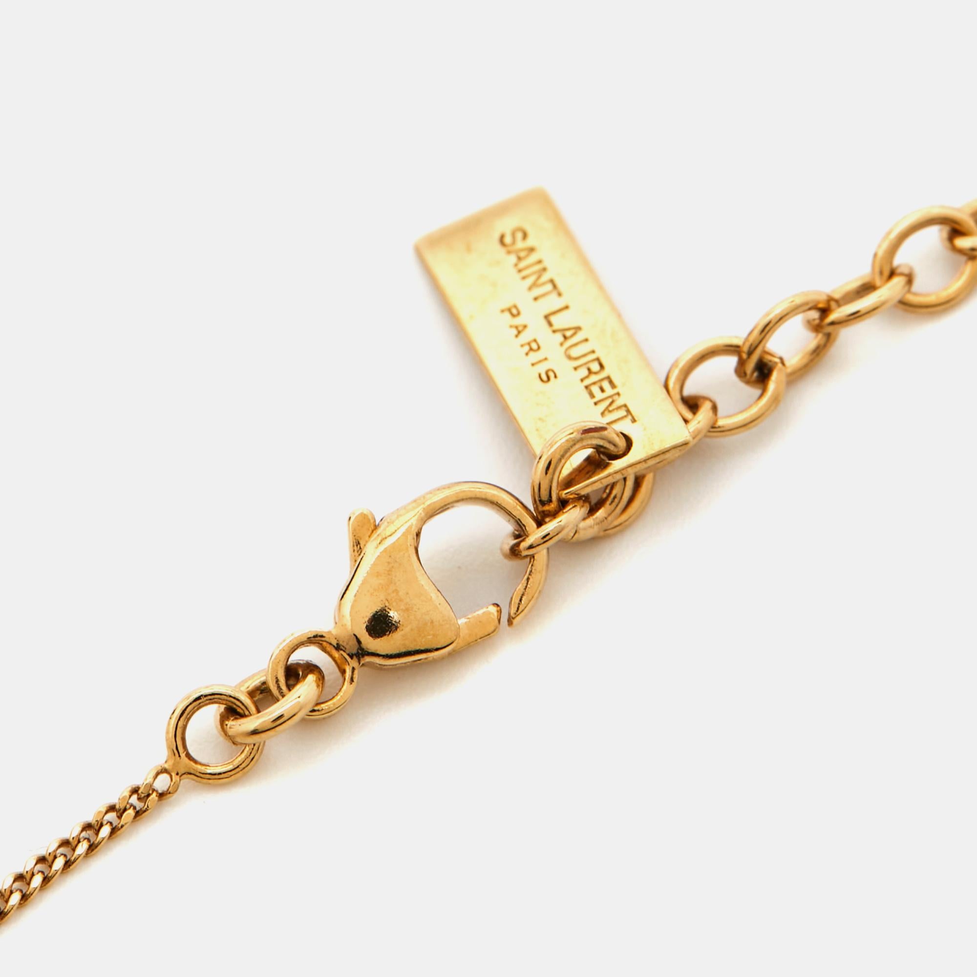 Women's Saint Laurent Paris Gold Tone Opyum Charm Bracelet