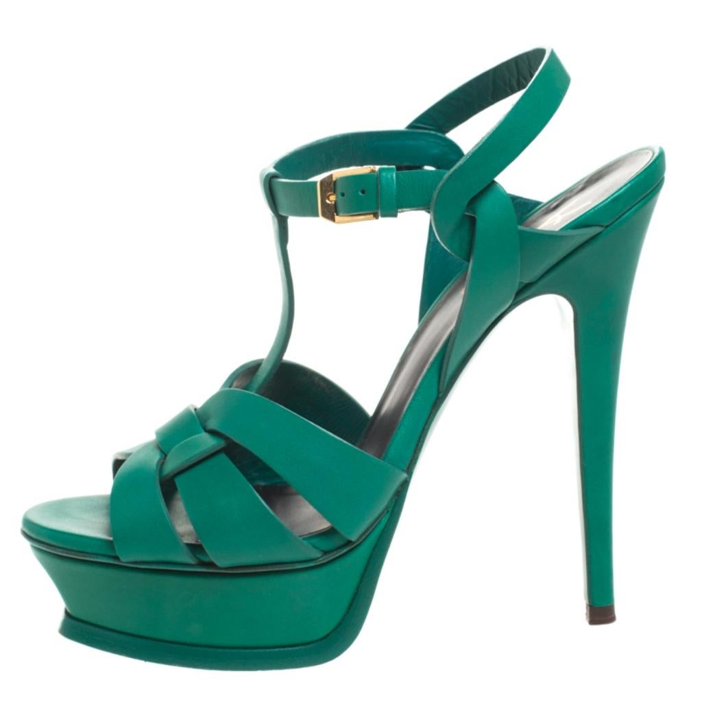 One of the most sought-after designs from Saint Laurent is their Tribute sandals. They are such a craze amongst fashionistas around the world, and it is time you own one yourself. These green ones are designed with leather straps, ankle fastenings