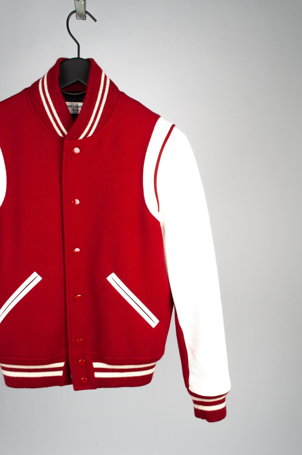100% genuine Saint Laurent Paris Teddy Bomber, S609
Color: red/white
(An actual color may a bit vary due to individual computer screen interpretation)
Material: Wool/Leather
Tag size: 44IT (Small)
This jacket is great quality item. Rate 8.5 of 10,