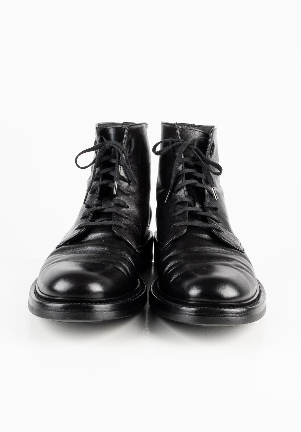 100% genuine Saint Laurent Men Boots, S563
Color: black
(An actual color may a bit vary due to individual computer screen interpretation)
Material: leather
Tag size: EUR41, USA 7 ½, UK 6 1/2
These shoes are great quality item. Rate 8.5 of 10, very