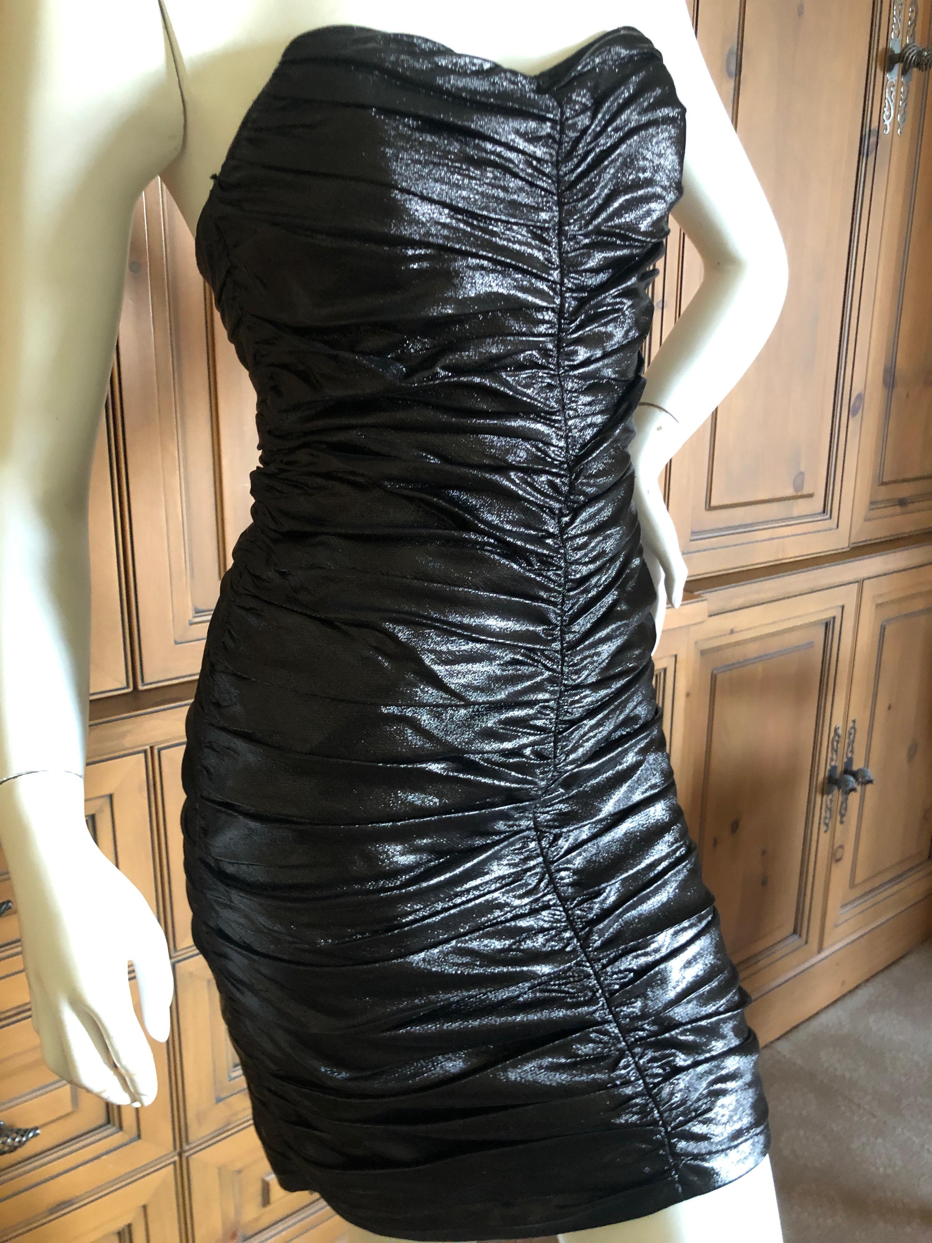  Saint Laurent Paris Metallic Shirred Black Strapless Mini Cocktail Dress.
Full inner corset . There is a lot of stretch, ,measured not streched.
French Size 36
Bust 34