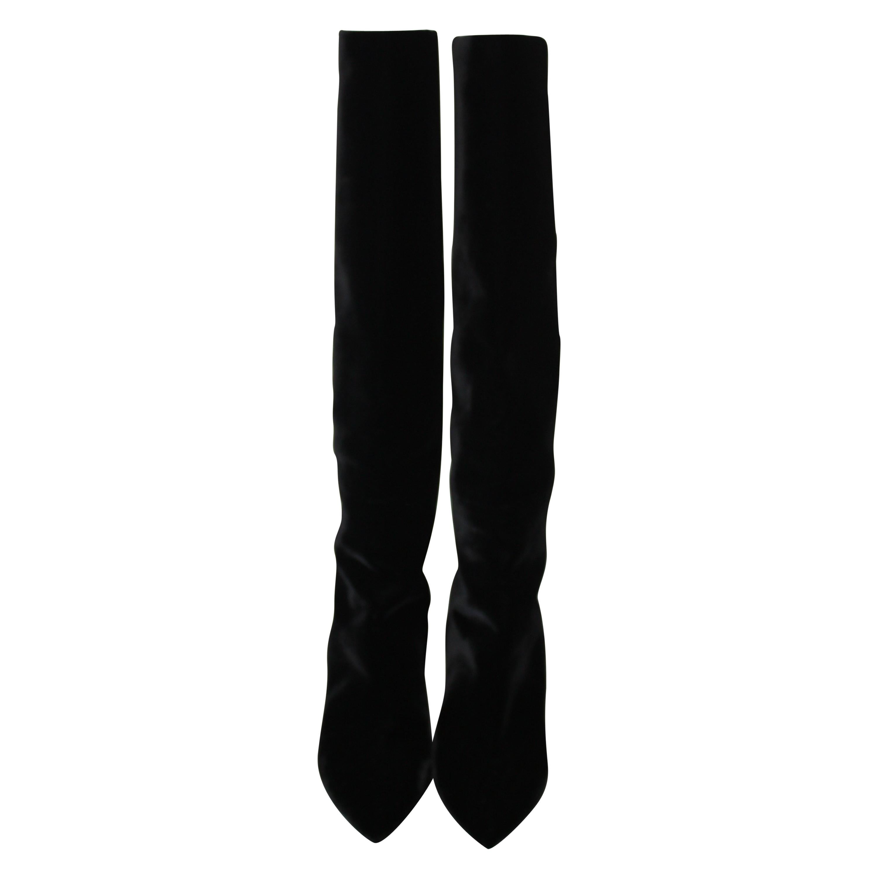 Saint Laurent Niki black velvet slouch boots. Come to just about your knee (depending on your height.) 
Pointy toe and slight wedge. These boots are epic! Current season. 
Little to no signs of wear.
Size 39