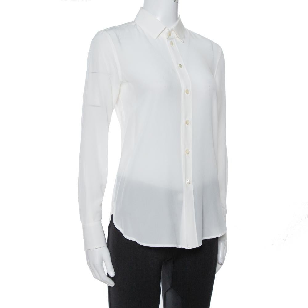 This off-white shirt from Saint Laurent is comfortable to wear. The creation comes in silk with a simple collar, front button fastenings, and long sleeves. A pair of tailored trousers or a skirt will complement the shirt well.

Includes: Price Tag,