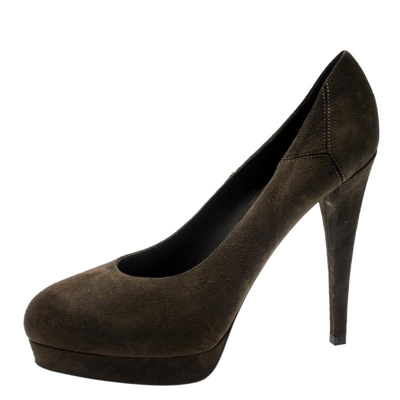 This pair by Saint Laurent has a very charming appeal. The classy pair is crafted from suede and features a comfortable leather sole with heel support of height 12.5cm. Style your outfit by pairing it with these elegant green pumps.

Includes: