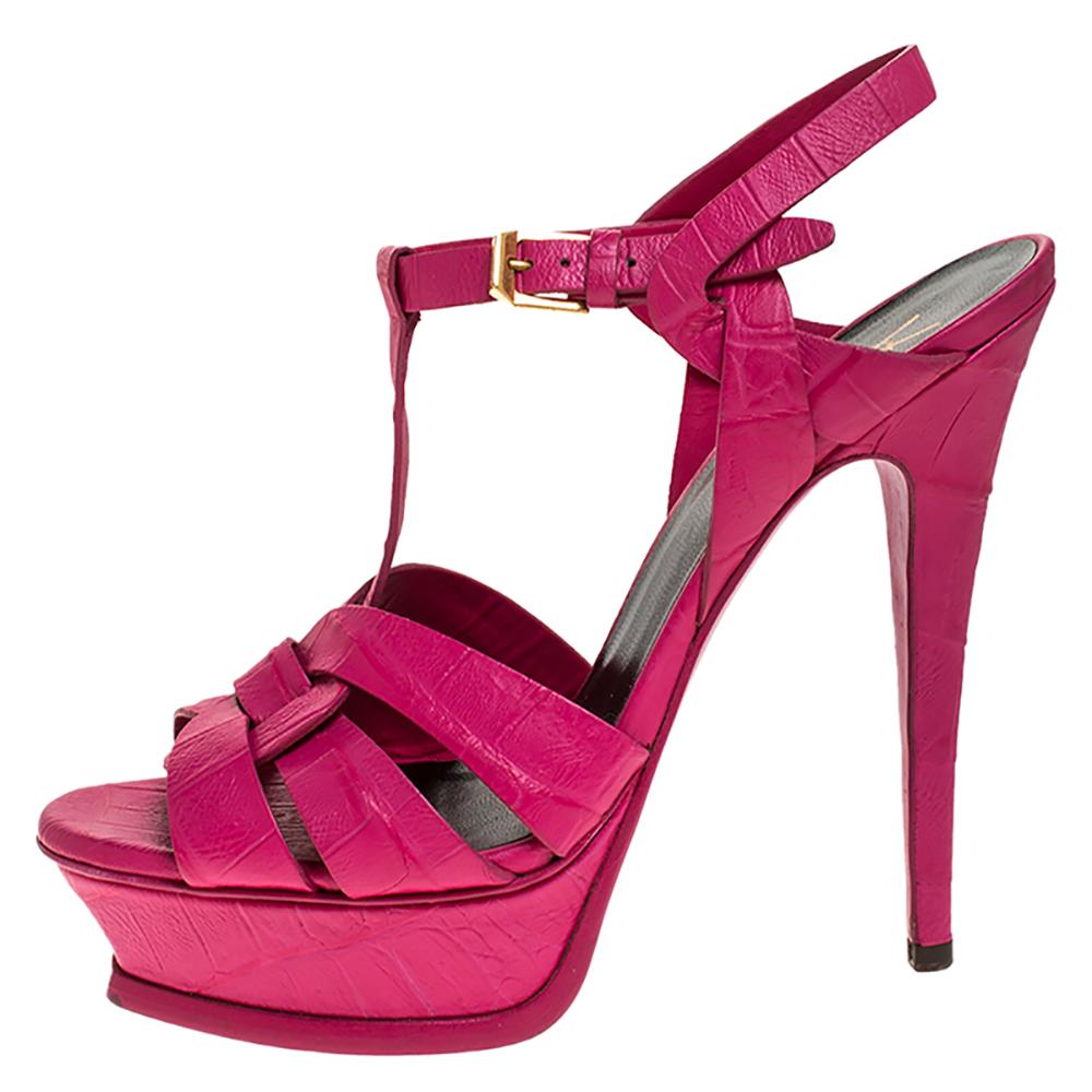 One of the most sought-after designs from Saint Laurent is their Tribute sandals. They are such a craze amongst fashionistas around the world, and it is time you own one yourself. These pink ones are designed with croc-embossed leather straps, ankle
