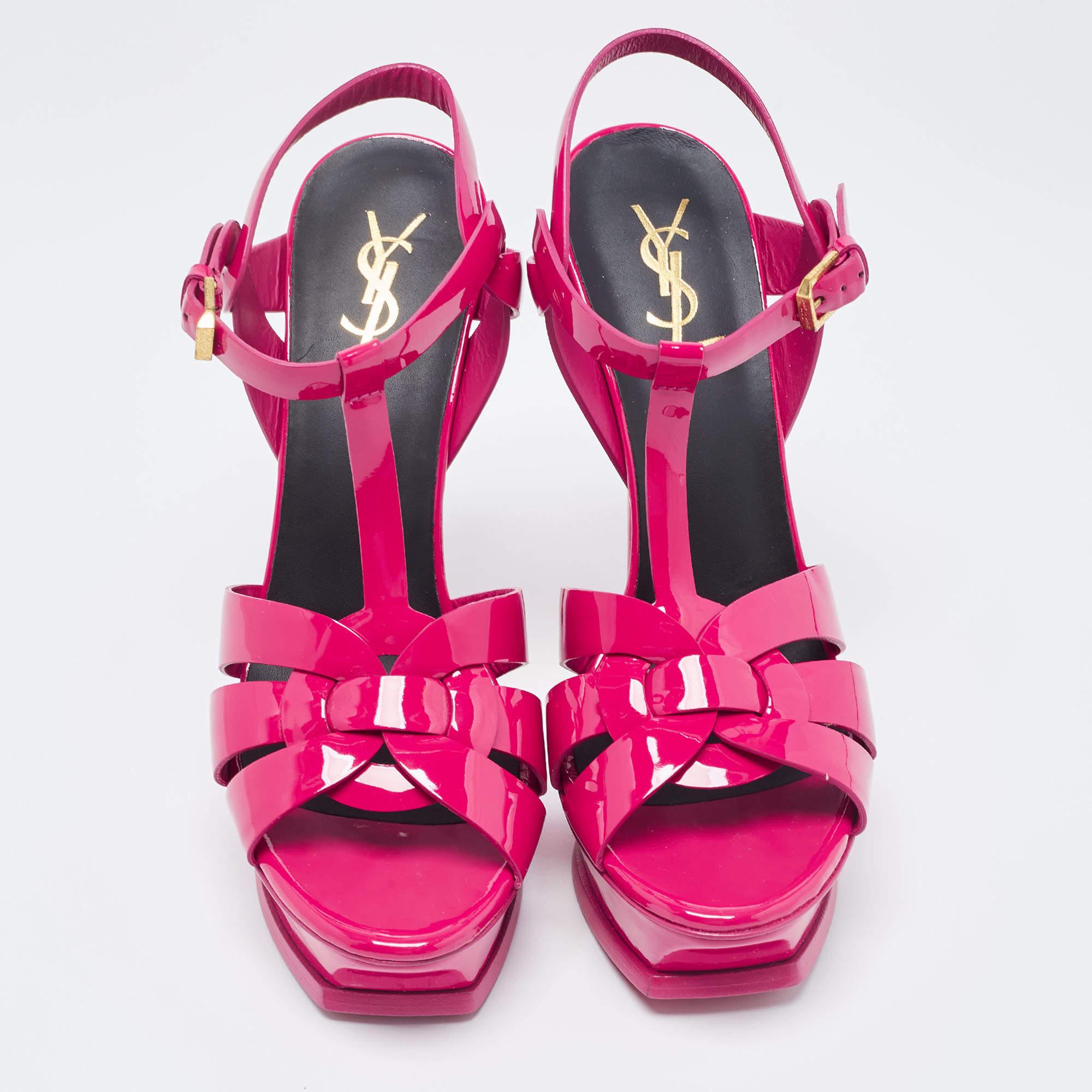 The fashionista in you will fall in love with these Saint Laurent Tribute sandals. They are made from leather with intertwined straps on the vamps and ankle buckle closure. The gold-tone hardware, 14cm heels, and platform give this pair a fine