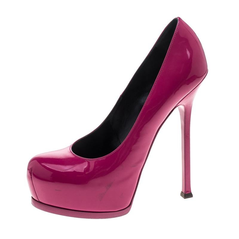 Fashionable and chic, these Tribtoo pumps from Saint Laurent will add shine and gloss to your closet. Crafted from patent leather, the pumps have a pink shade, concealed platforms, and 15.5 cm heels.

Includes: The Luxury Closet Packaging

