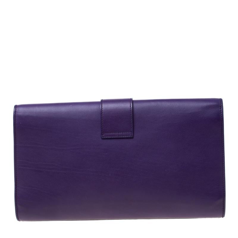 This classic luxury comes from the fashion house of Saint Laurent Paris. Crafted from leather, this Chyc clutch is designed with a flap closure and features a well-sized satin interior. This accessory will hold your cash, lipstick, keys and other