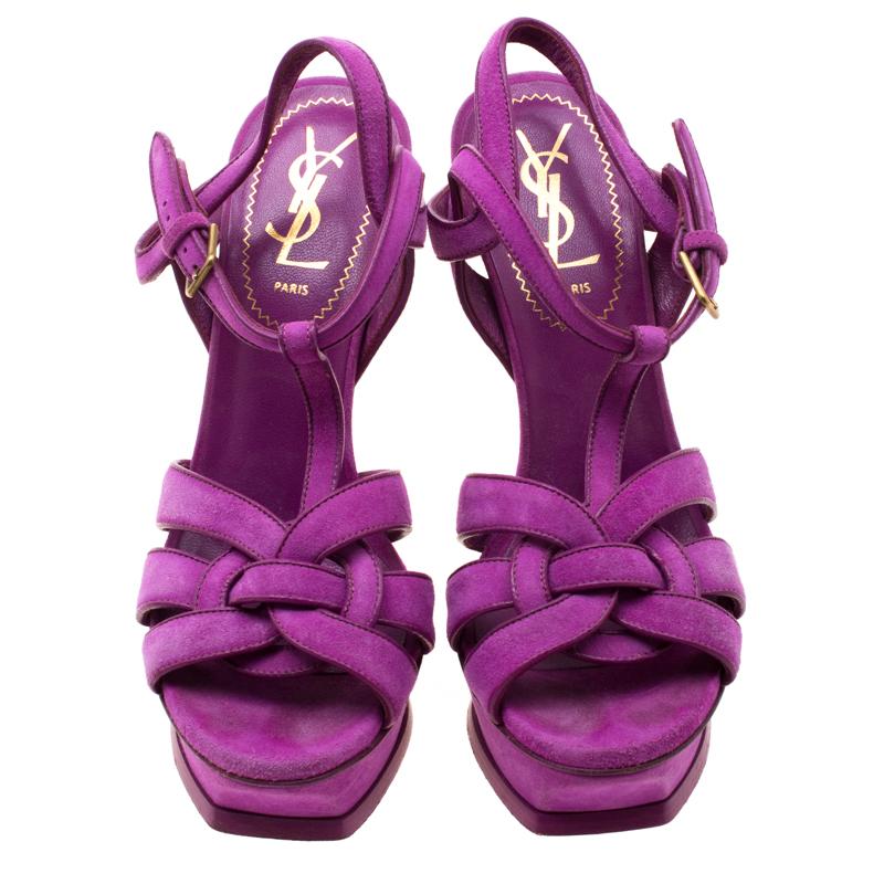 One of the most sought-after designs from Saint Laurent is their Tribute sandals. They are such a craze amongst fashionistas around the world, and it is time you own one yourself. These purple ones are designed with suede straps, ankle fastenings