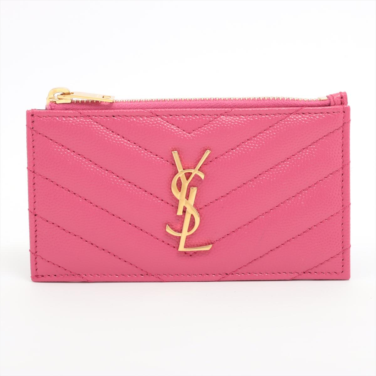 The Saint Laurent Paris V Stitch Leather Coin Card Wallet in Pink is a chic and practical accessory that combines functionality with timeless style. Crafted from high-quality leather, the wallet features Saint Laurent's signature V stitch pattern