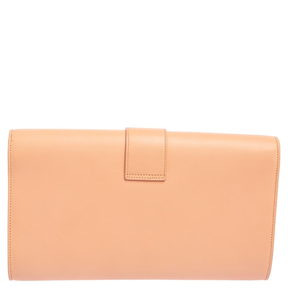 The Y-Ligne clutch by Saint Laurent is a creation that is not only stylish but also exceptionally well-made. It is a design that is simple and sophisticated, just right for the woman who embodies class in a modern way. Meticulously crafted from