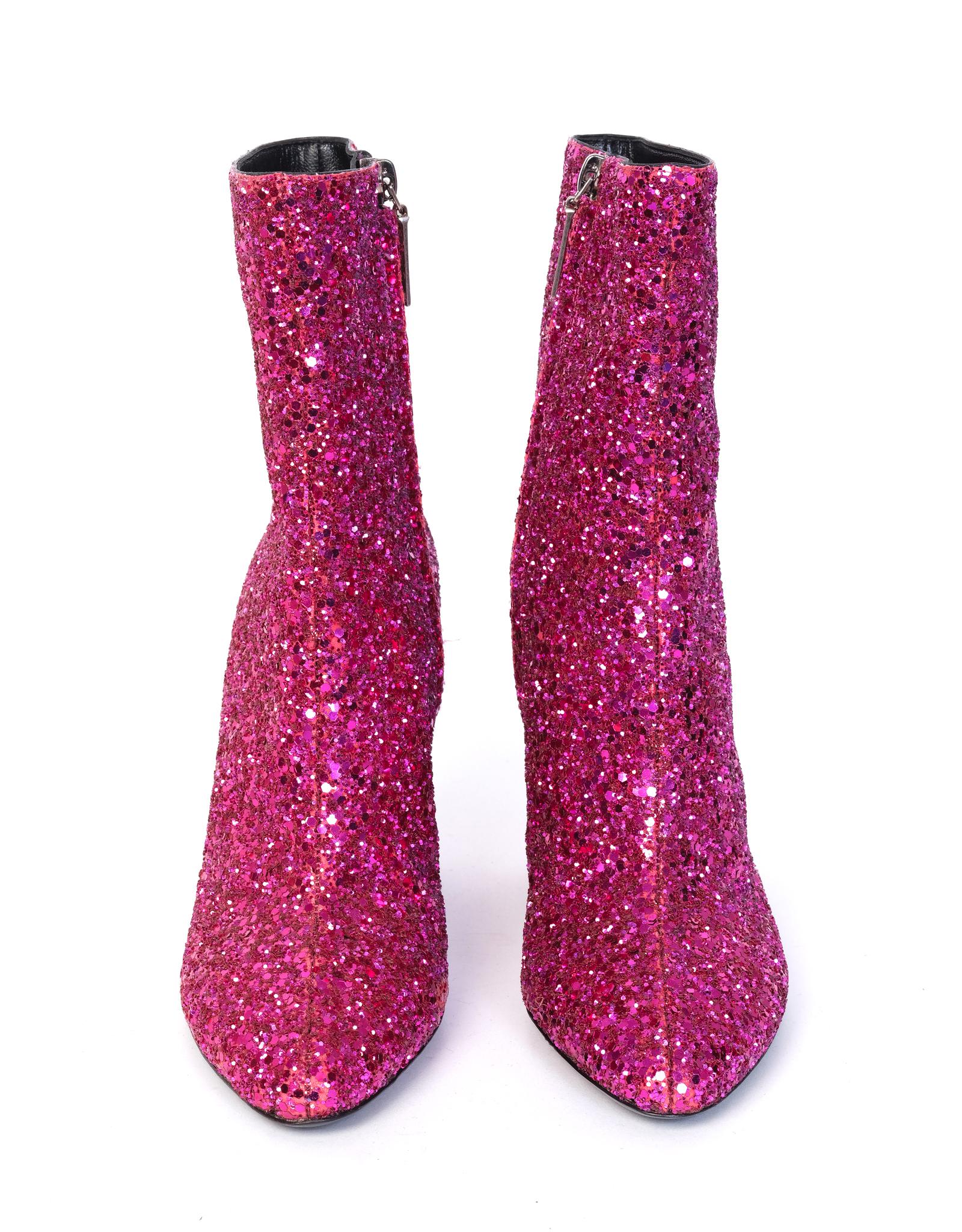 Featuring a pink glitter exterior, a leather black leather interior, side zippers, a heel height of 3.75 inches, and black soles.

COLOR: Pink
ITEM CODE: CA 539210
MATERIAL: Leather & glitter
SIZE: 36 EU / 5.5 US
HEEL HEIGHT: 95 mm (3.75