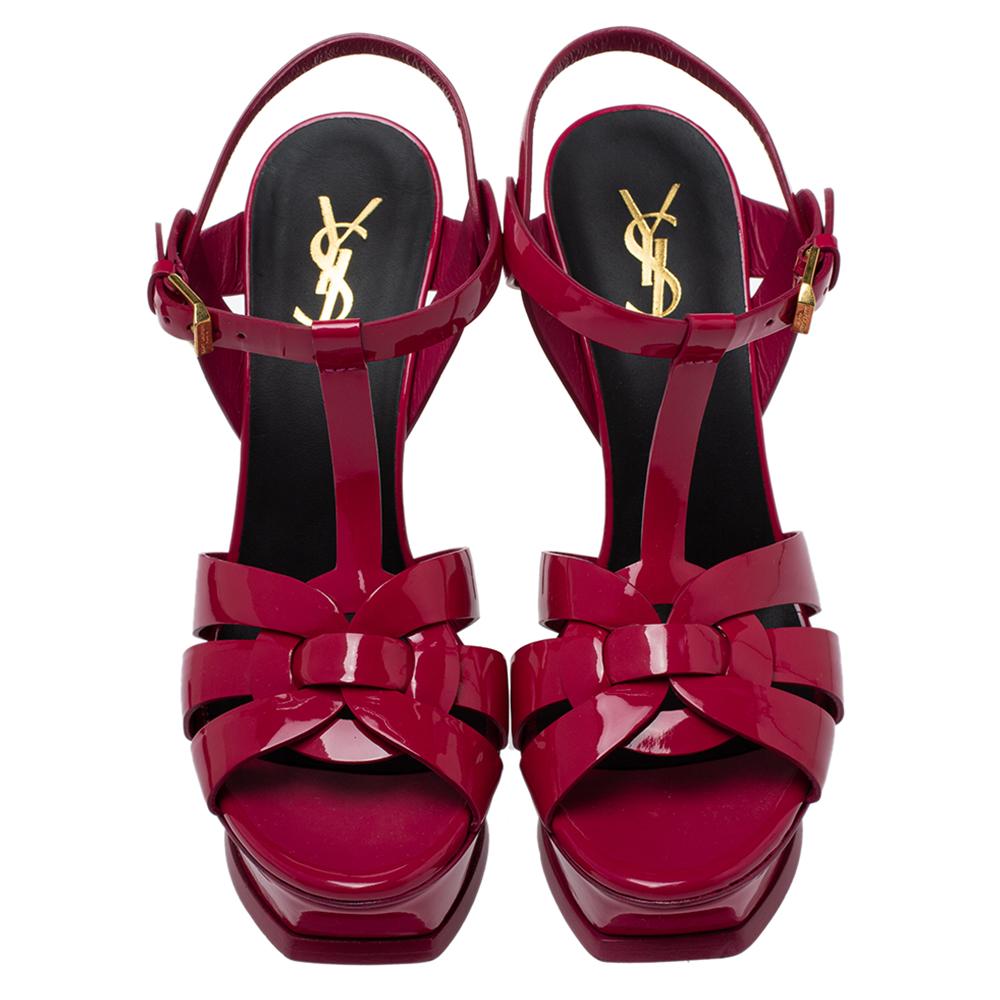 One of the most sought-after designs from Saint Laurent is their Tribute sandals. They are such a craze amongst fashionistas around the world, and it is time you own one yourself. These pink-hued ones are designed with patent leather straps, ankle