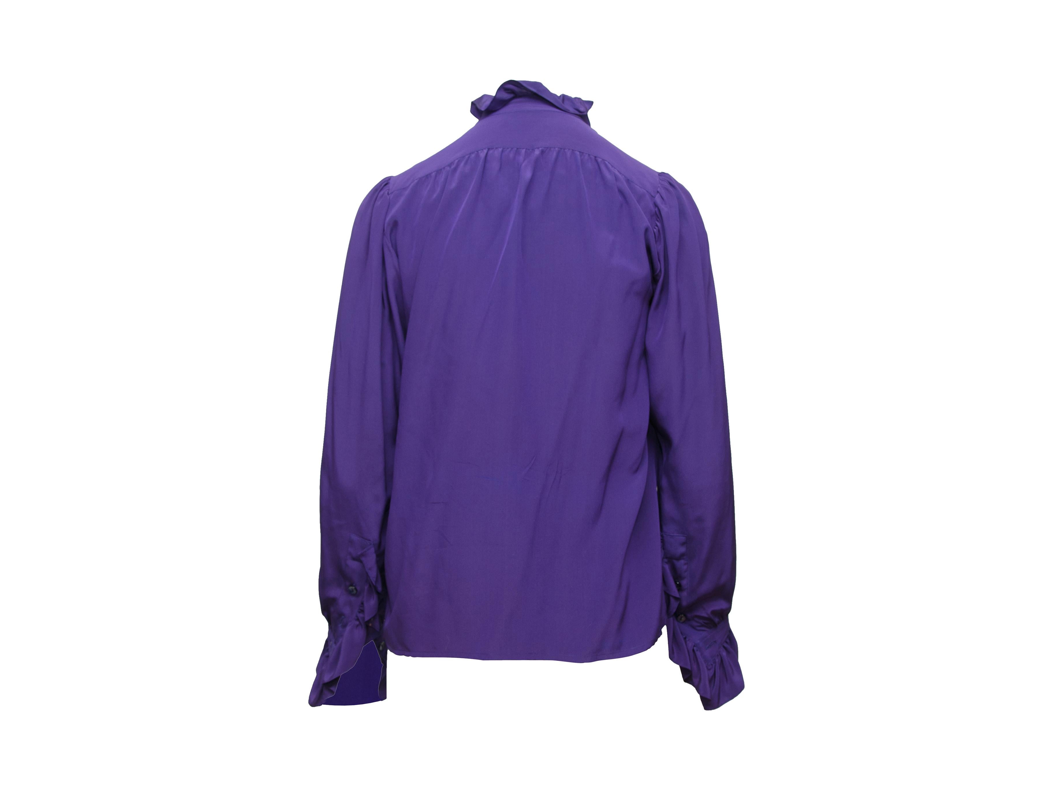 Product details: Vintage purple silk top by Saint Laurent. Ruffle trim throughout. High collar. Long sleeves. Button closures at bust. Designer size 36. 36