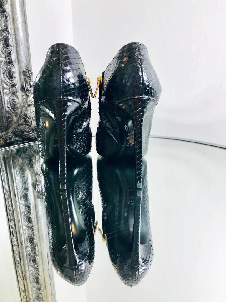 Women's Saint  Laurent Python Ankle Booties. Size 37.5 For Sale