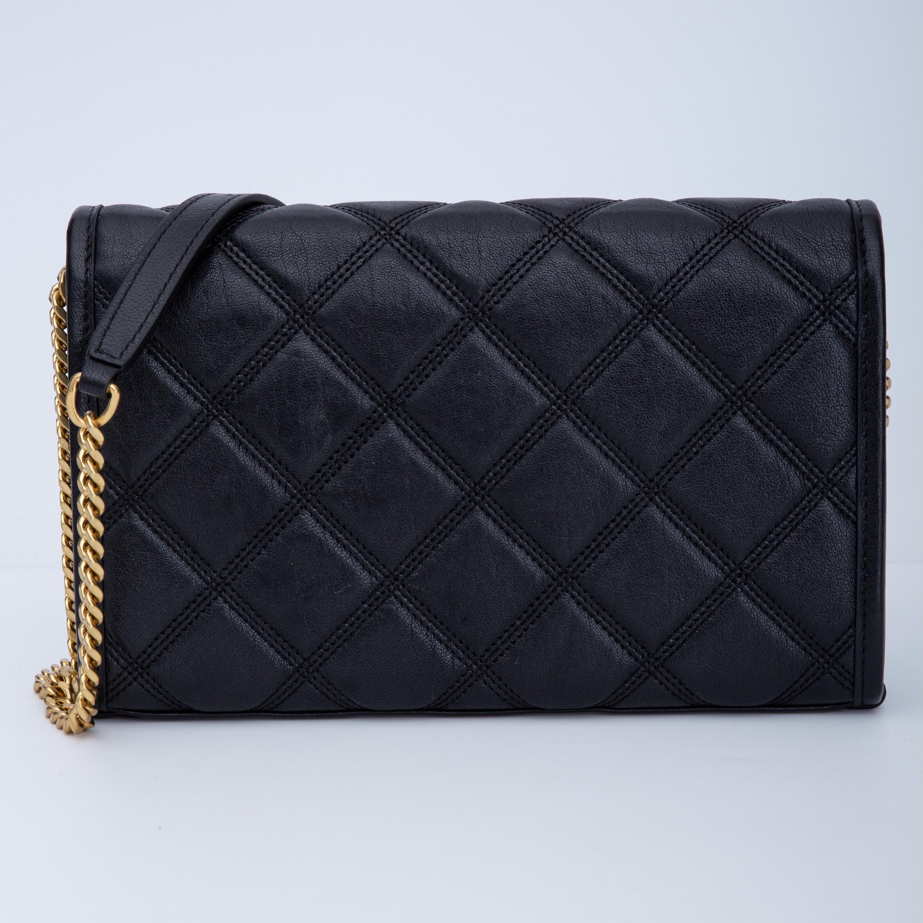 This Becky Mini Chain bag features gold tone hardware, grosgrain lining, a magnetic snap closure and an interior zip pocket. Made in Italy of 100% Lambskin. It also has an adjustable chain strap.

COLOR: Black
MATERIAL: Calfskin leather
MEASURES: H