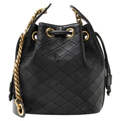 Saint Laurent Quilted Lambskin Cassandre Small Bucket Bag
