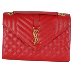 Saint Laurent Borsa media a busta con catena Monogram Matelasse Rosso