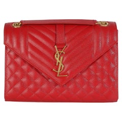 Saint Laurent Borsa media a busta con catena Monogram Matelasse Rosso