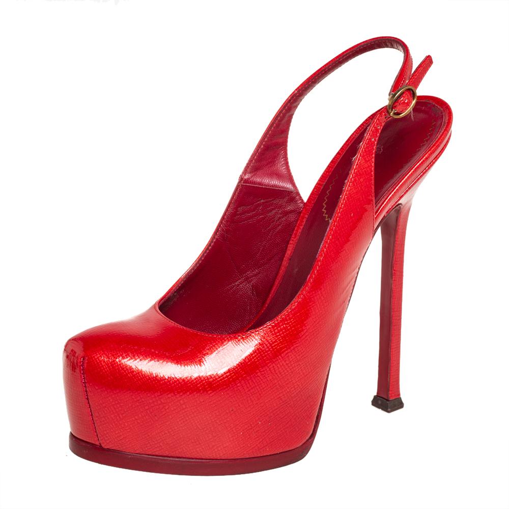 Fashionable and chic, these Tribtoo sandals from Saint Laurent will cut an alluring silhouette from day to night. Crafted from patent leather, the pumps have a red shade, slingback straps, concealed platforms, and 14 cm heels.

Includes: Original