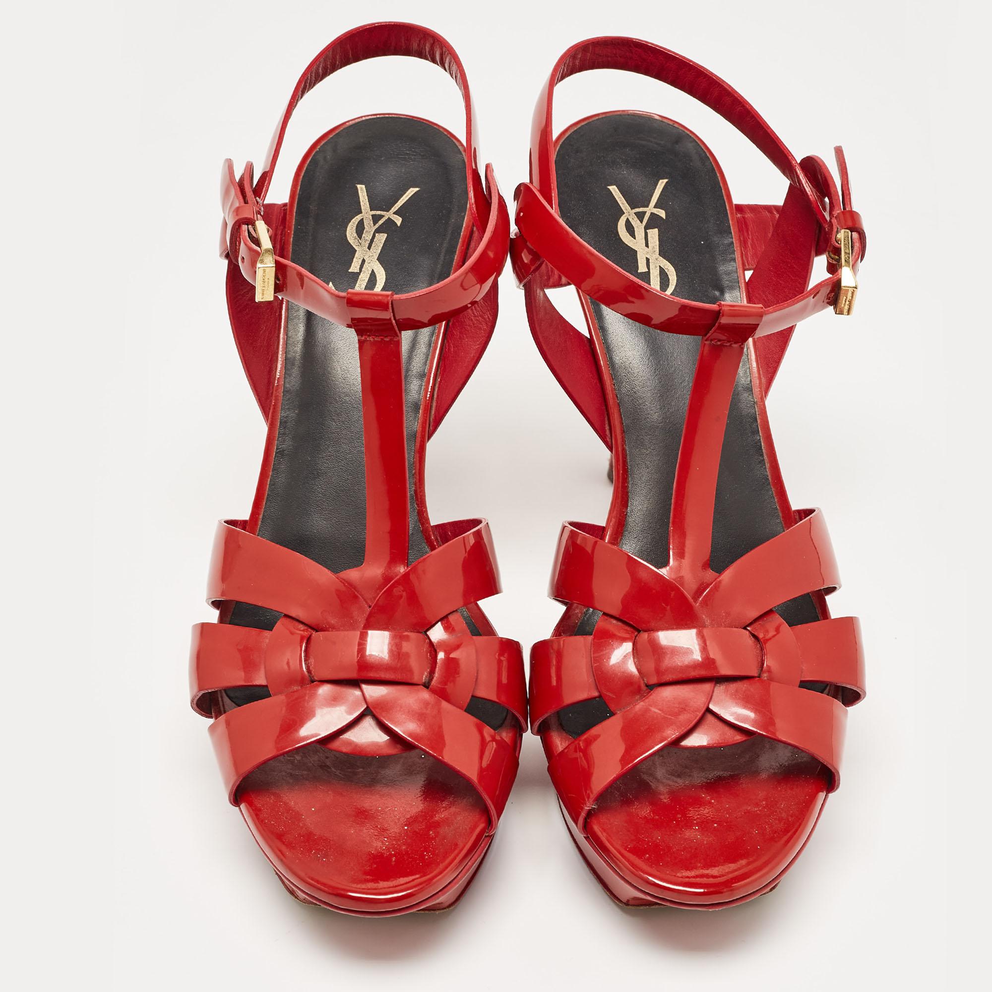One of the most sought-after designs from Saint Laurent is their Tribute sandals. They are such a craze amongst fashionistas around the world, and it is time you own one yourself. These red ones are designed with leather straps, ankle-buckle