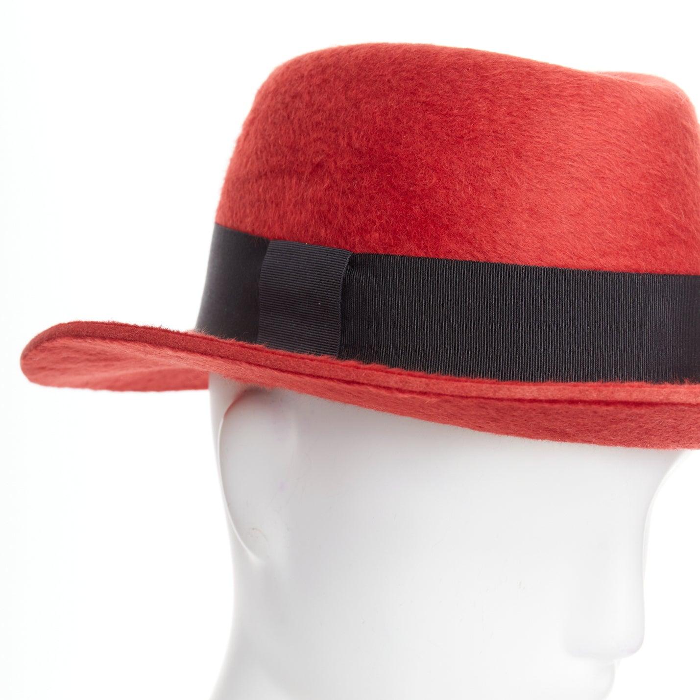 SAINT LAURENT red rabbit felt black grosgrain leather lined fedora hat
Reference: NKLL/A00374
Brand: Saint Laurent
Designer: Anthony Vaccarello
Material: Wool
Color: Red, Black
Pattern: Solid
Closure: Slip On
Lining: Black Leather
Extra Details: