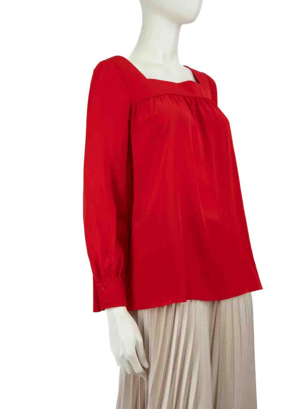 CONDITION is Good. General wear to the blouse is evident. Moderate signs of wear to the front with discoloured marks on this used Saint Laurent designer resale item.
 
Details
Red
Silk
Blouse
Square neck
Gathered detail
Long puff sleeves
Buttoned