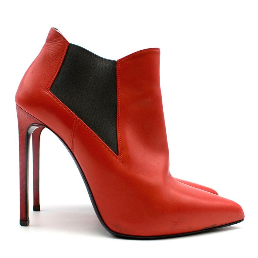 Saint Laurent Red Chelsea boot Heels with angled toe edge.

- Black side elastic panelling on outer side 
- Pointed toe 

Please note, these items are pre-owned and may show signs of being stored even when unworn and unused. This is reflected within