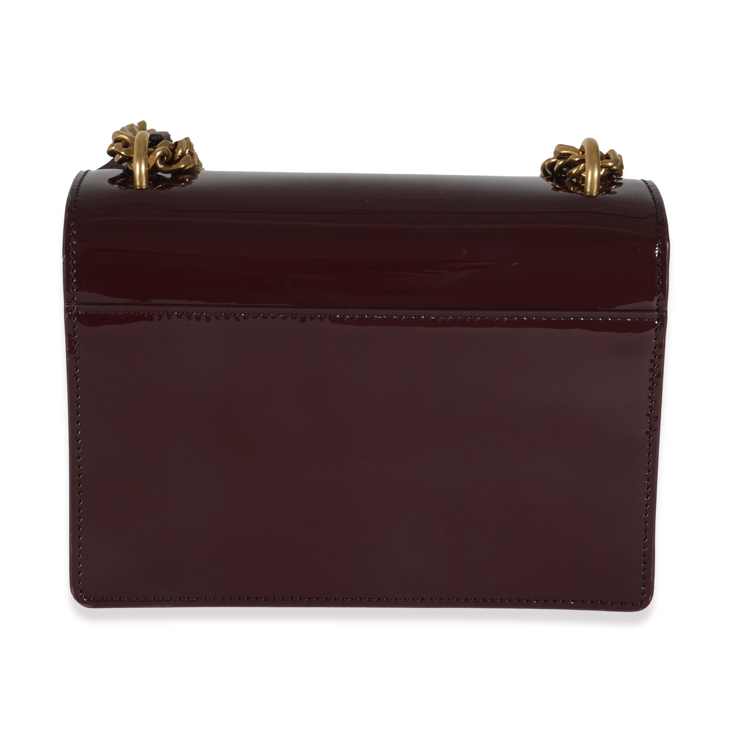 Listing Title: Saint Laurent Red Wine Patent Monogram Small Sunset Bag
SKU: 144701
MSRP: 2990.00 USD
Condition: Pre-owned 
Handbag Condition: Pristine
Condition Comments: Item has no indication of wear.  Final sale.
Brand: Saint Laurent
Model: