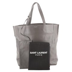 Saint Laurent Wendbare North South Shopper Tote aus Leder mit Nieten in Grau
