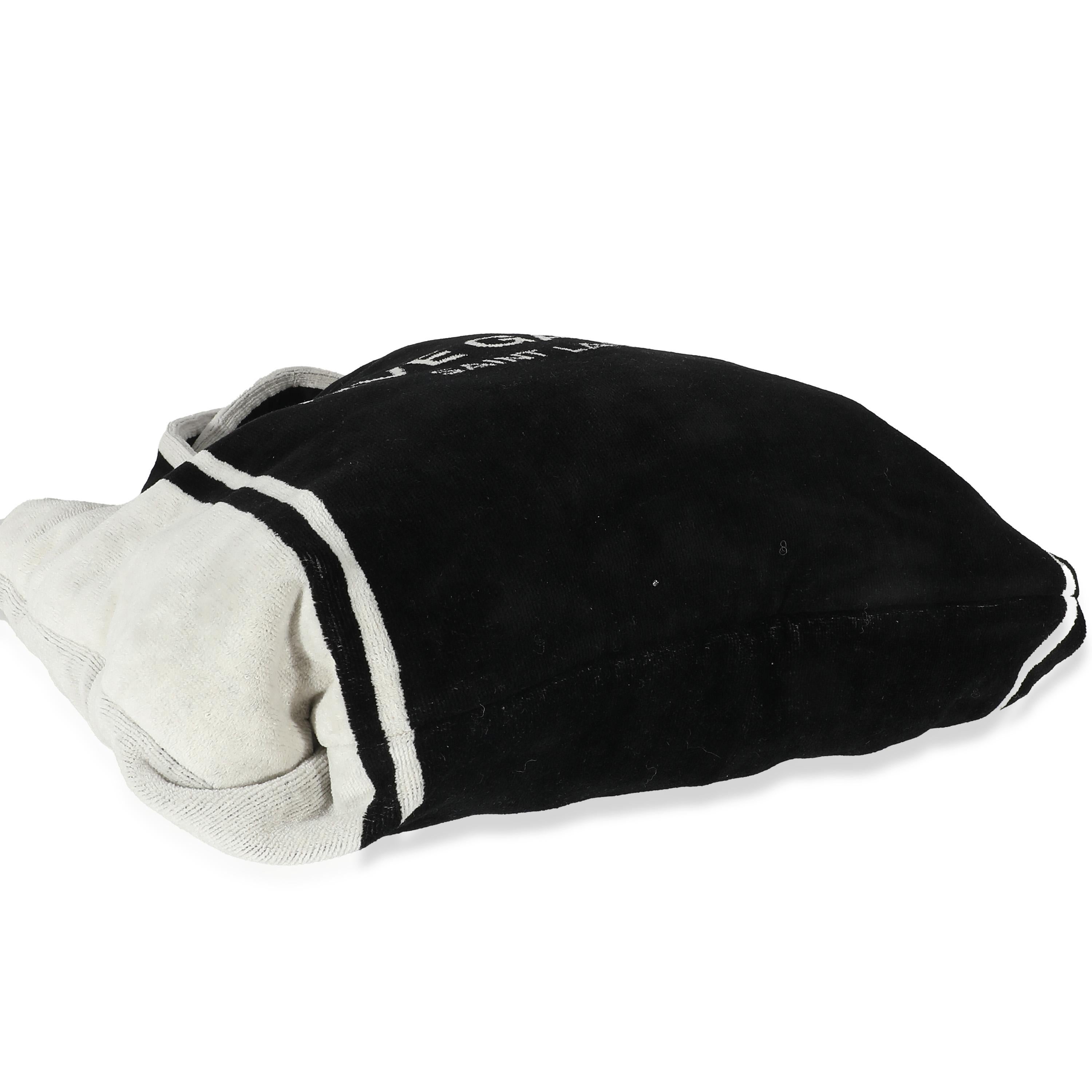 Listing Title: Saint Laurent Rive Gauche Black White Terry Cloth Beach Towel Tote
SKU: 135401
MSRP: 2100.00 USD
Condition: Pre-owned 
Handbag Condition: Excellent
Condition Comments: Item is in excellent condition and displays light signs of wear.