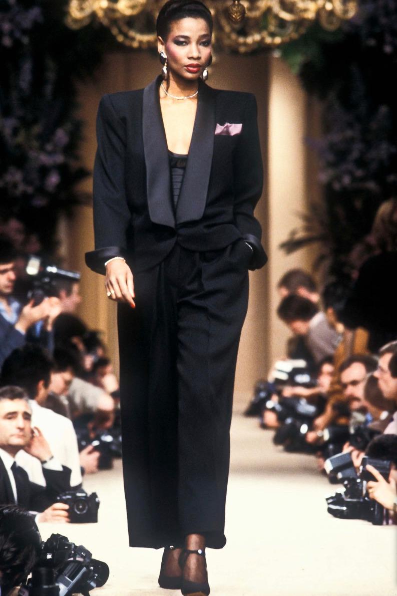 - Spring /Summer 1984 YSL Rive Gauche runway collection by Yves Saint Laurent

- Sold by Mae Vintage London 

- Black wool with silk satin trim 
