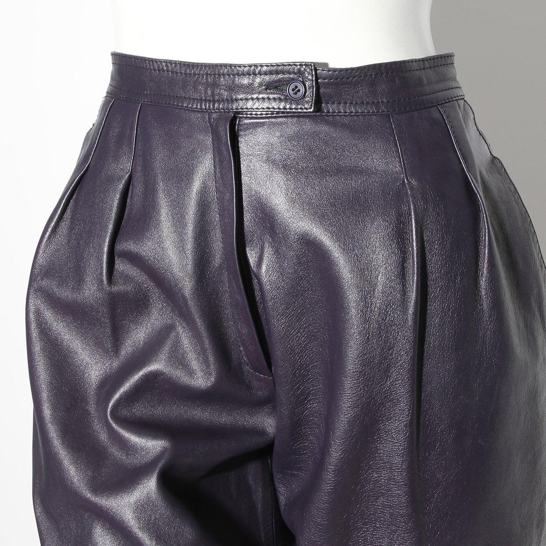 Saint Laurent Rive Gauche Culottes 
Purple 
Made in France 
Pleated details on front of the pant 
Pockets on each side of the pant 
Double D ring closures at hem of pant 
Flap closure with button at waist
100% Lambskin
Lined in acetate 
Circa