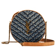 Bolso cruzado redondo Saint Laurent de tela vaquera acolchada y vinilo